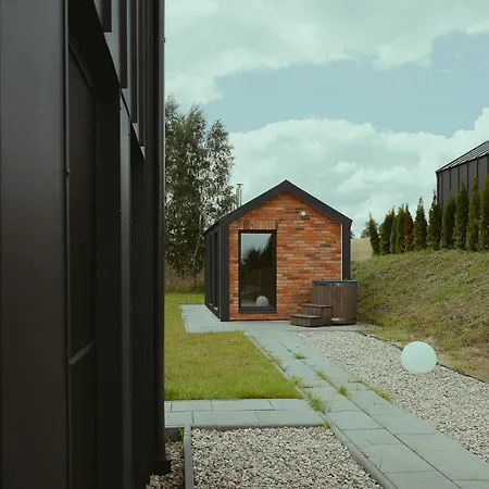 Pod Lasem Bania-sauna 度假居 *